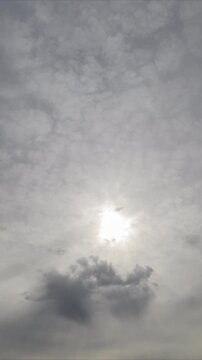 Overcast sky ambiance, Gray clouds create muted lighting, Cloud cover produces soft diffused daylight atmosphere, Atmospheric scene with layered clouds and subdued natural tones