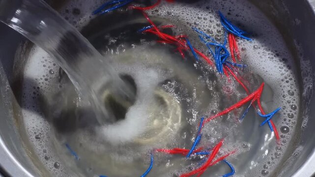 Understanding Microfiber Pollution from laundry, a key contributor to the Plastisphere, and its implications for Trophic Transfer within aquatic ecosystems