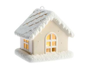Illuminated snowy house ornament glows warmly