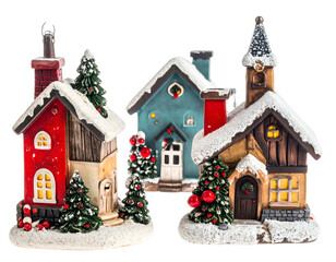 Festive, snow-dusted miniature village with glowing windows