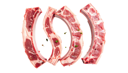 Four raw lamb ribs with herbs, isolated on black