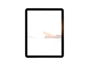 Modern tablet displays snowy mountain peak with golden sunrise