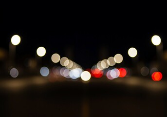 Abstract bokeh background featuring soft urban lights and subtle atmospheric blur, ideal for overlaying content or text and conveying a sense of presence, illuminated, context, setting