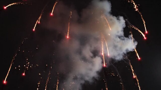 Close-up of a single firework rocket exploding, sparks spiraling in slow motion, smoke gently curling, colorful vibrant display, cinematic night effect.