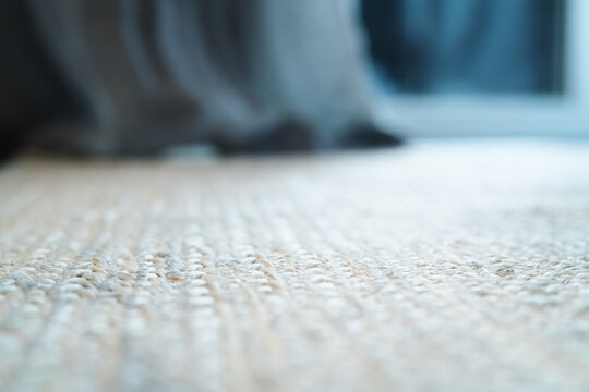pale jute floor rag background closeup