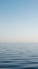 Obraz premium Seamless blending of smooth water and atmosphere creating an expansive, empty, and fluid natural horizon backdrop, atmosphere, design, ocean