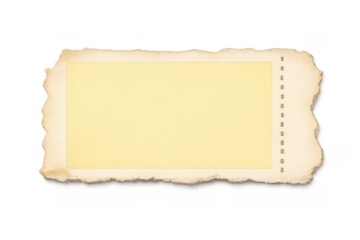 Aged torn paper label providing a blank yellow surface for text or design, featuring a burnt edge and perforated seam