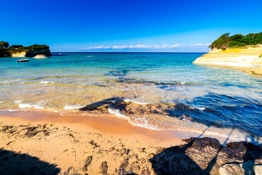 Kanali tou Erota, view of turquoise water and rocks on Corfu coast, Canal D'Amour, Greece. Concept a wonderful holiday vacation.