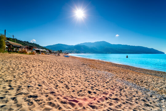 Georgios Beach with turquoise, view on Porto Timoni, tourist resort on island Corfu, holidays on Greek islands, Ionian Sea.