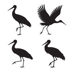 Fototapeta premium Four black silhouettes of cranes in different poses on a white background