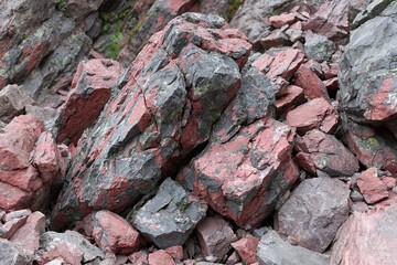 Red and grey rocks on a mountain