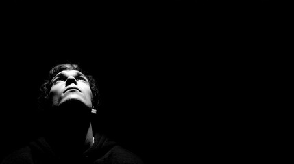 A man is looking up at the camera