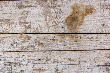 Detailed close up of rustic wooden planks with natural grain, rough texture, scratches, and weathered surface. Perfect background for design projects, vintage decor, carpentry, and creative artwork.
