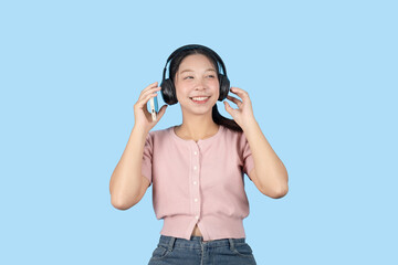 young teen girl happy smile enjoy music from phone, listening music by headphone studio isolated