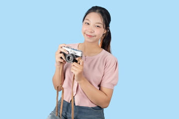 young teen happy smile enjoy photo hobby, girl model with vintage film camera studio shot isolated