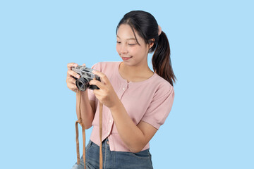 young teen happy smile enjoy photo hobby, girl model with vintage film camera studio shot isolated
