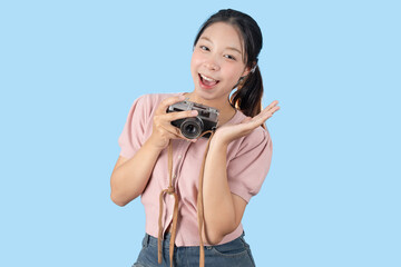 young teen happy smile enjoy photo hobby, girl model with vintage film camera studio shot isolated