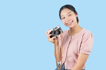 young teen happy smile enjoy photo hobby, girl model with vintage film camera studio shot isolated
