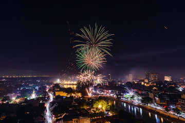 New year firework celebration in Chiang mai city, Thailand for background usage.