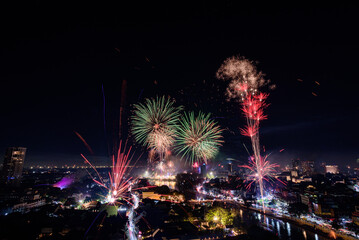 New year firework celebration in Chiang mai city, Thailand for background usage.