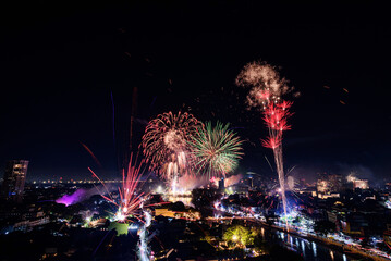 New year firework celebration in Chiang mai city, Thailand for background usage.