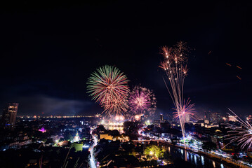 New year firework celebration in Chiang mai city, Thailand for background usage.