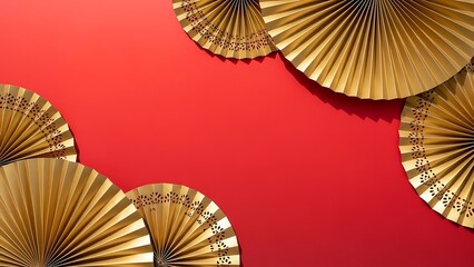 Golden paper fans on vibrant red background for celebration or design
