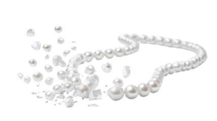 White pearls spilling out of broken pearl necklace on white background, jewelry damage concept with scattered pearls with broken jewelry and luxury fashion
