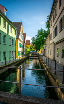 Colorful Historic Houses Along Narrow Water Canal in Memmingen, Germany