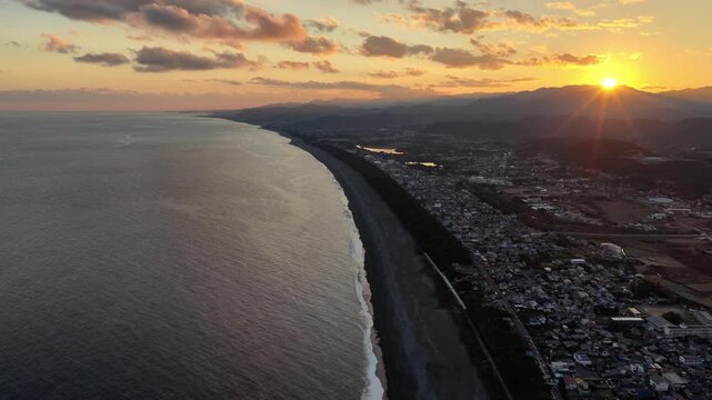 High-Altitude Forward Drone Flight Along Kumano Shichirimihama Coast at Sunset, Japan