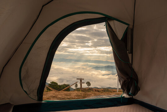 Camping tents in the mountains, and morning mist.