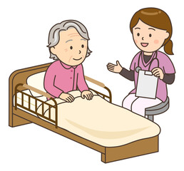 おばあさんとベッドサイドで寄り添う若い女性看護師