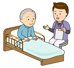 おじいさんとベッドサイドで寄り添う若い男性看護師