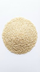 highly detailed bright studio image of creamy white sesame seeds piled densely