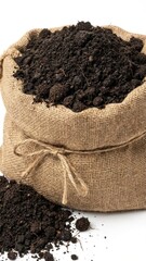 close up isolated studio shot of fertile dark compost overflowing from a tied brown sack
