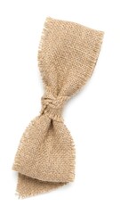 rough textured natural brown jute fabric centerpiece knot against pure white studio background