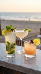 crushed ice cocktails garnished with purple pansies lime wheels on marble beach bar