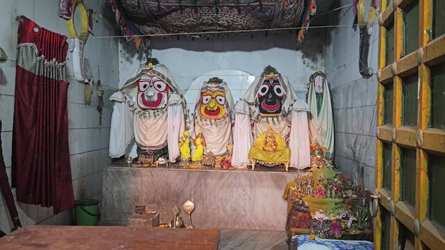 Lord Jagannath Balabhadra And Subhadra Idol with Ornate Crown and Floral Garlands, Decorated Hindu Deity in Odisha Tradition, Devotional Temple Worship, Spiritual and Cultural Heritage