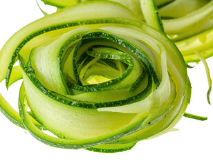 Close-up of spiraled, thinly sliced vegetable, artfully arranged on a dark background