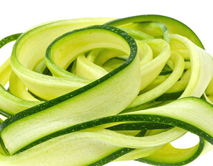 Close-up of spiraled zucchini noodles, vibrant green-yellow, fresh, and healthy-looking