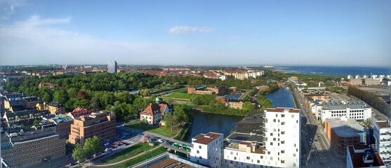 Panoramic city view over Malm&ouml; Sweden with castle park and sea under blue sky