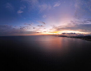 Aerial shot of Xinli Building in Shanwei Port, Shanwei City, Guangdong Province, captured at sunset