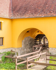 Old, traditional water mill wheel at old lake Tata city, Hungary, Europe