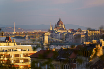 Autunm-colored cityscape about main attractions ofg Budapest city. Szechenyi chain bridge, Hungarian parliamanets building and margit bridge are included