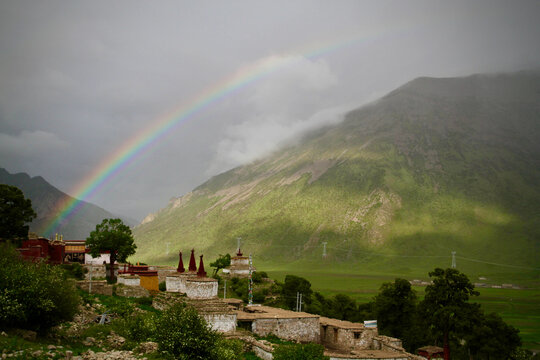 Rainbow over Reting Stuppas in Himalayas, Tibet, China