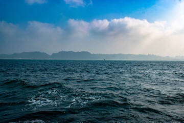 Obraz premium Sea and a boat alone blue sky