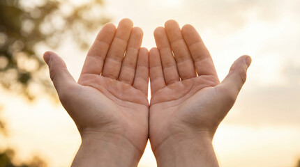 Two open palms raised to the sky symbolizing freedom, hope, and spirituality