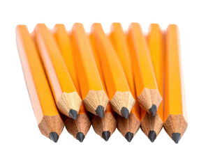 Close-up of yellow pencils clustered together on a dark background