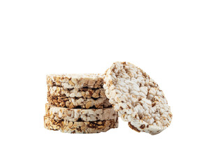 Natural toasted puffed rice crackers stacked in a neat pile with one cracker leaning against them