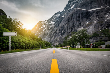 Yellow dividing line on asphalt mountain road